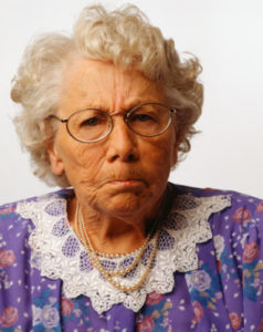 Grumpy senior woman, posing in studio, (Portrait)